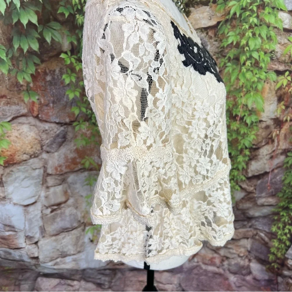 FREE PEOPLE Cottagecore Cream Peplum Blouse with Black Lace Ruffles, M
